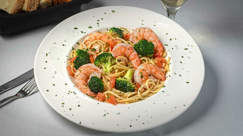 Shrimp with broccoli over pasta